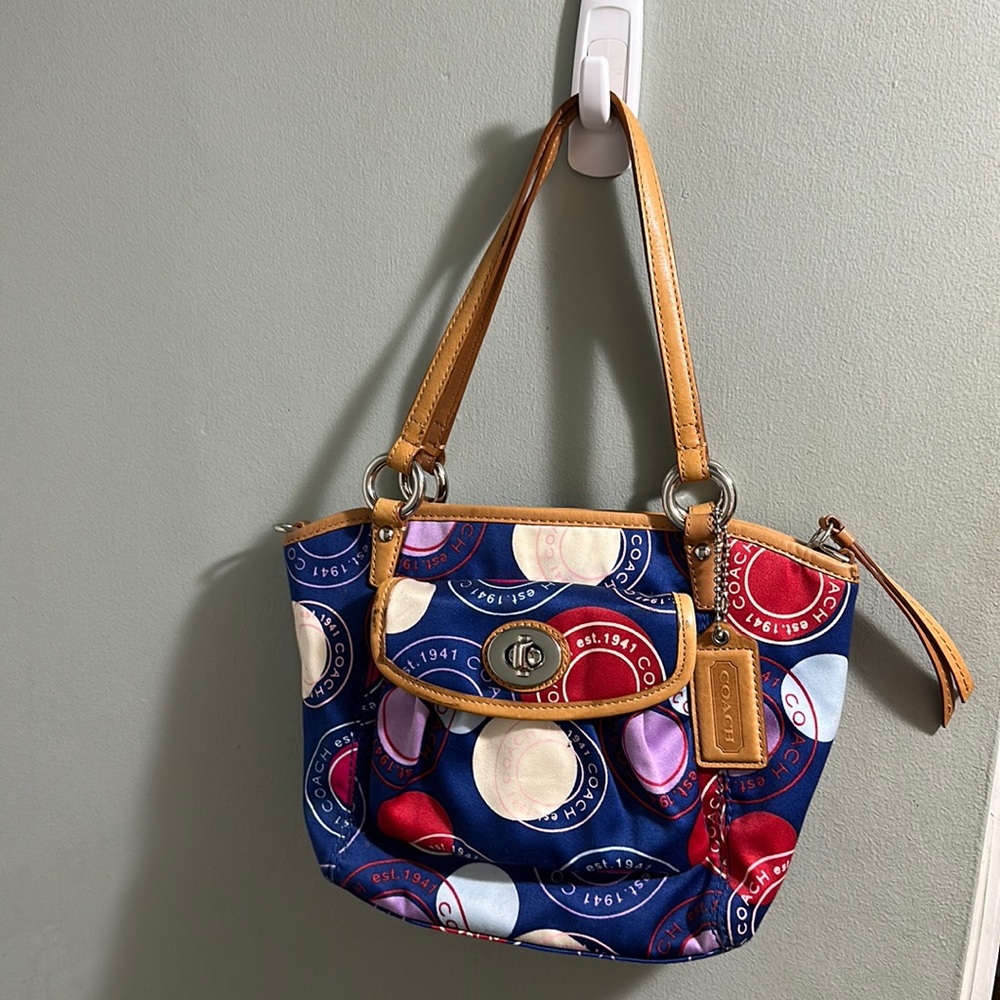 coach in excellent condition I do not have the strap